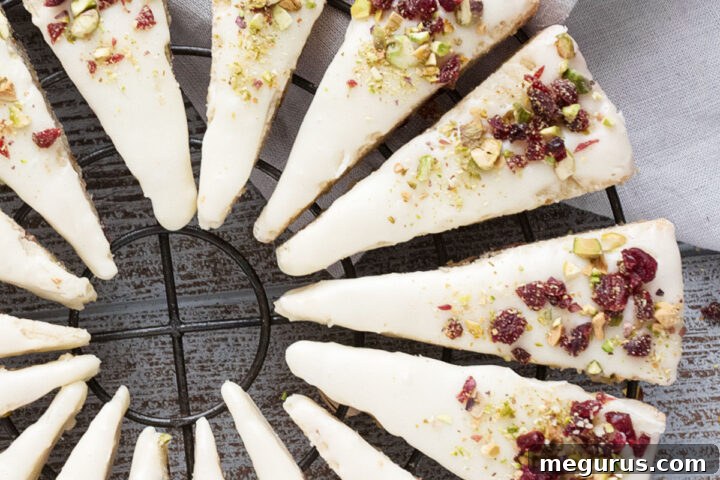 cranberry pistachio shortbread wedges on cooling rack
