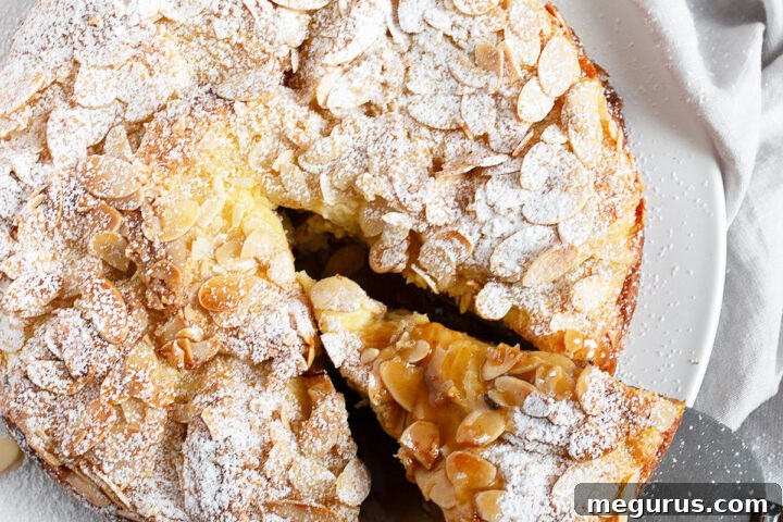 almond bread pudding sliced on plate