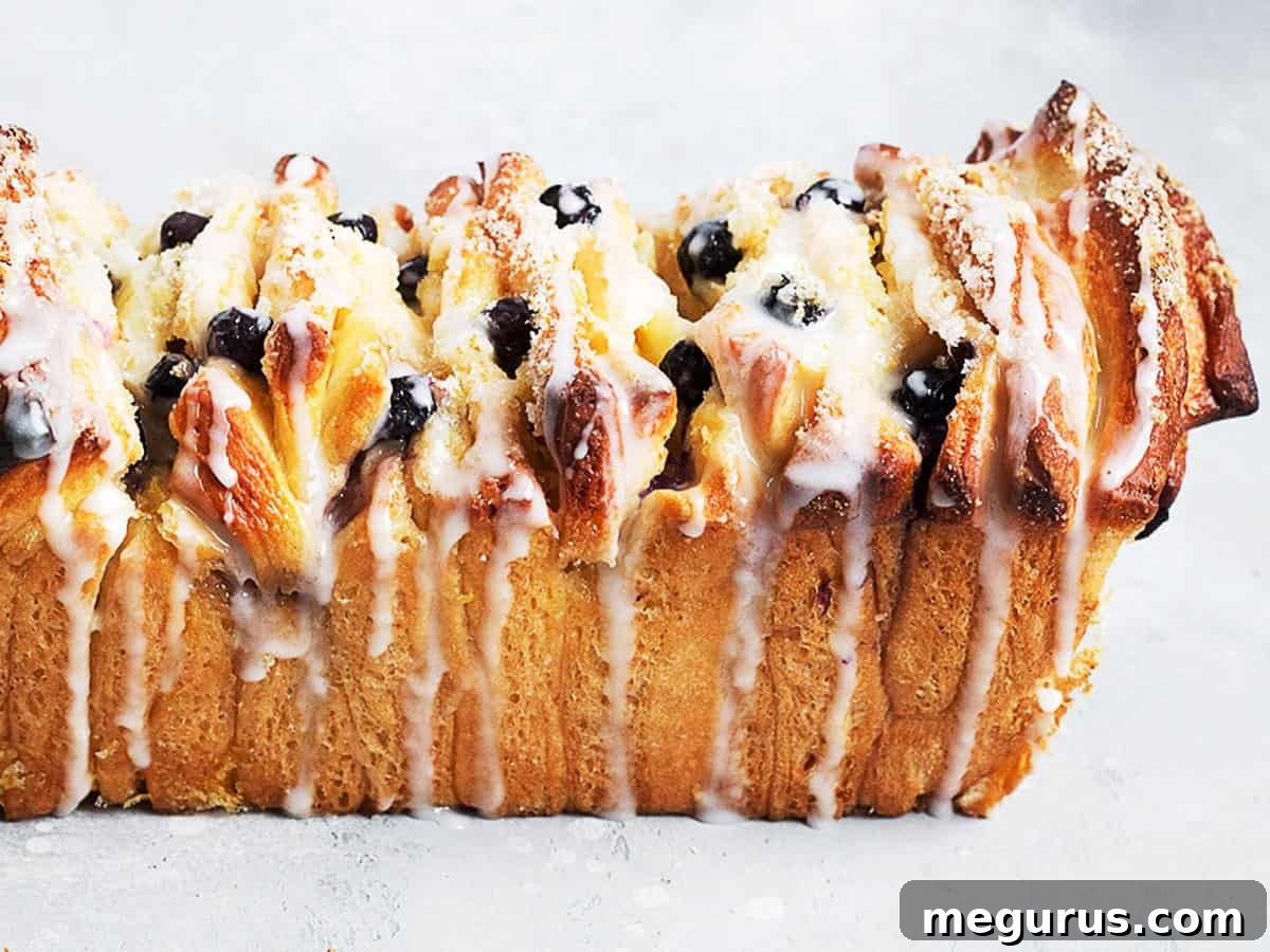 Delicious Lemon Blueberry Pull Apart Bread from above, showcasing its golden crust and blueberry swirls