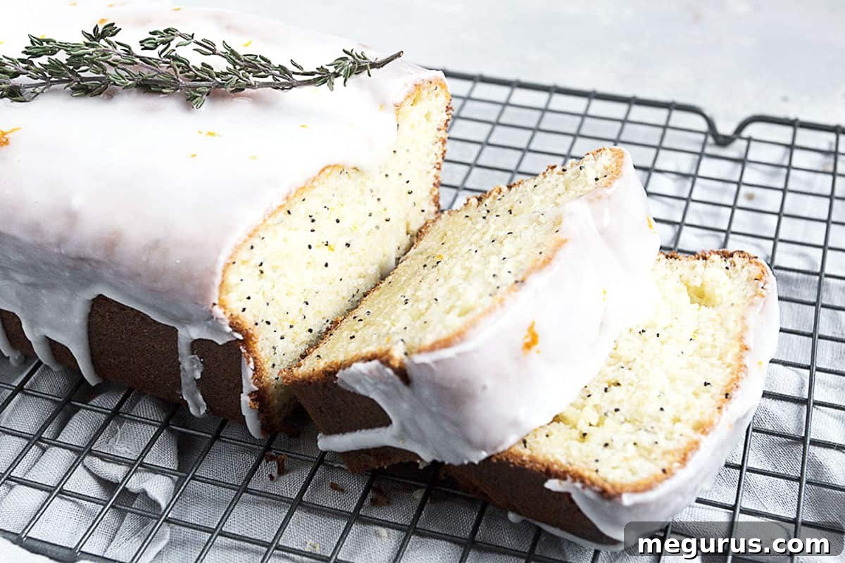 orange poppy seed loaf on cooling rack