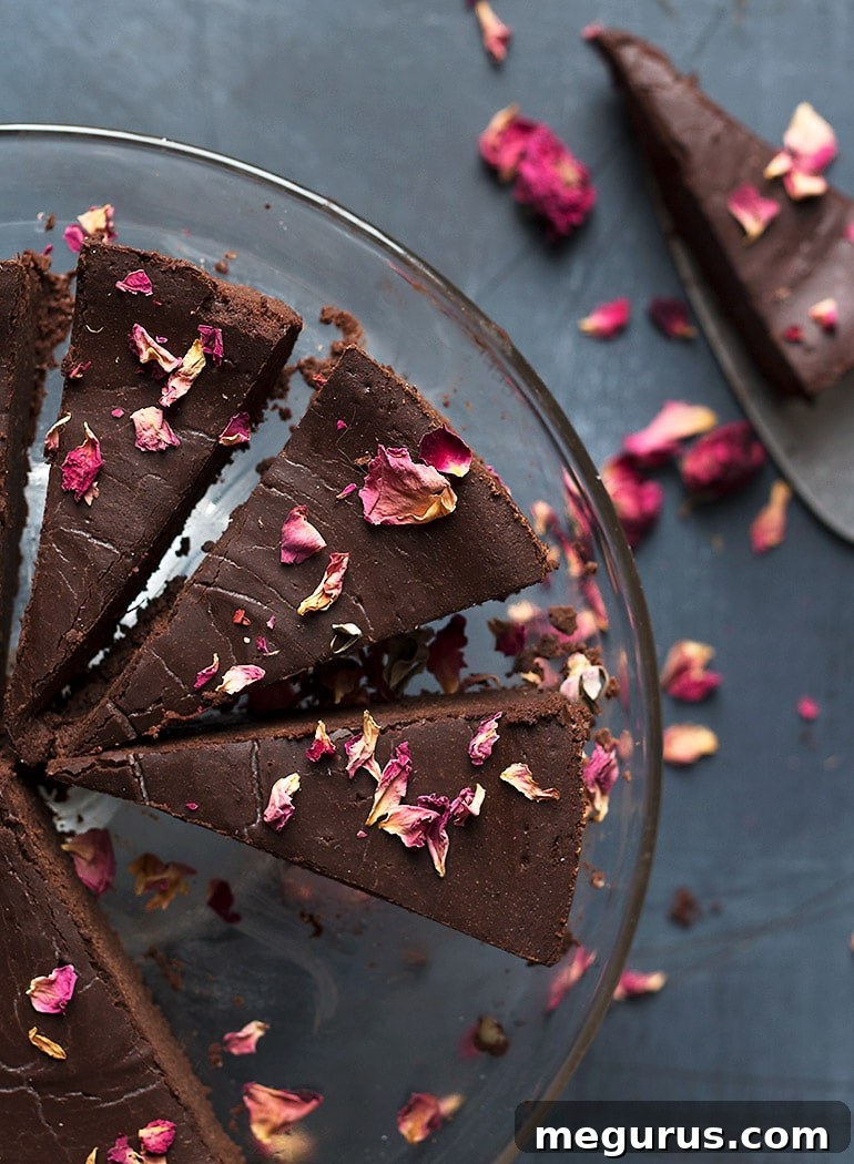 Flourless Chocolate Truffle Cake decorated with edible flowers
