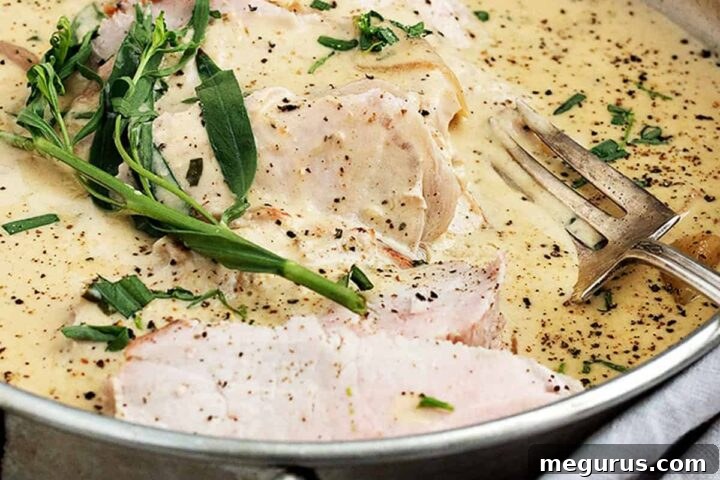 Pork loin tarragon sliced in pan with sauce