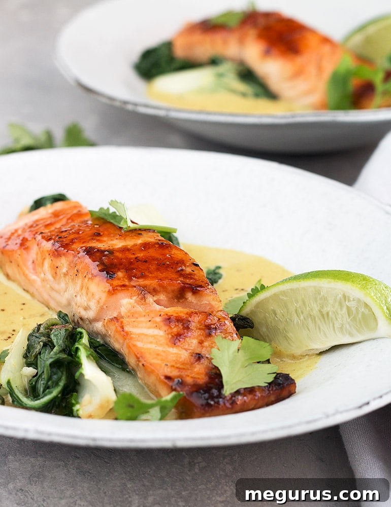 Close-up of Sugar-Seared Salmon with Coconut Lime Sauce and bok choy.