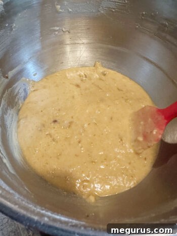 The final, well-combined cake batter, ready for the baking pan