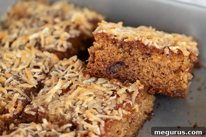 Queen Elizabeth Cake sliced in baking pan, ready to serve