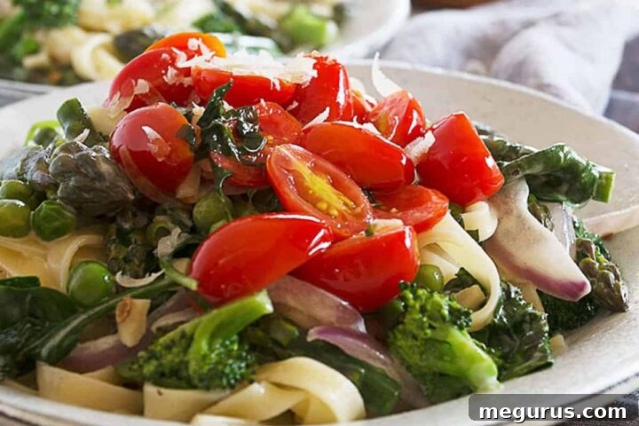 Classic Pasta Primavera with a creamy sauce and fresh vegetables.