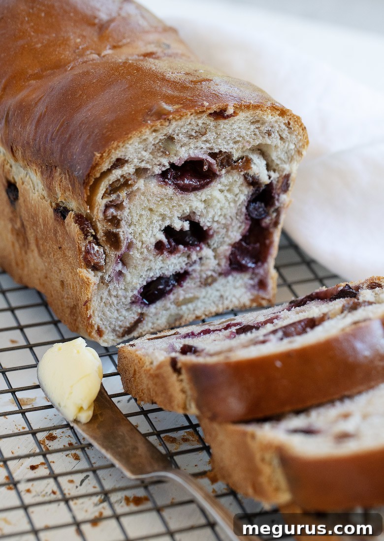 cherry yeast bread sliced on cooling rack, close up