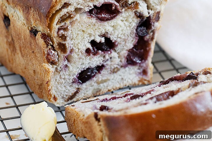 fresh cherry yeast bread sliced on cooling rack