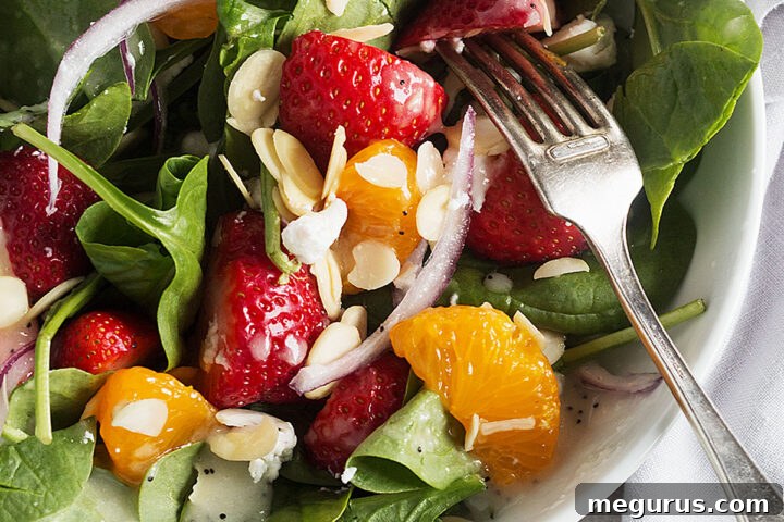 spinach strawberry mandarin salad in bowl