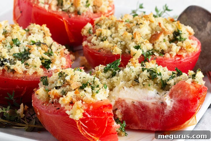 tomatoes stuffed with goat cheese on plate