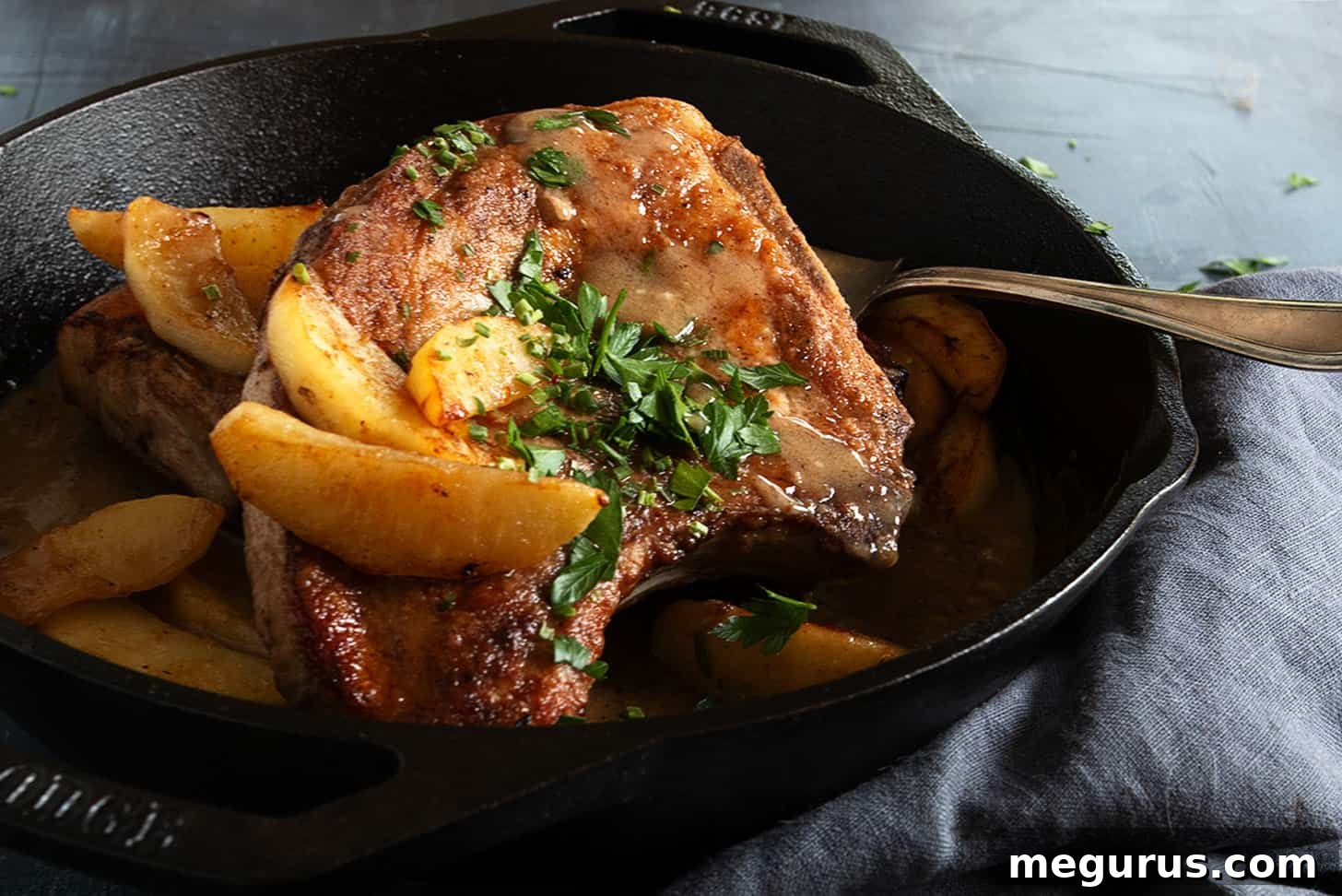 pork chops with apples in cast iron skillet