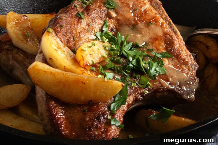 pork chops with apples in cast iron skillet