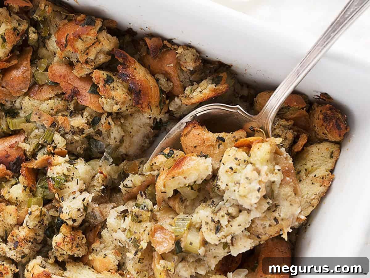 classic bread stuffing in casserole with spoon