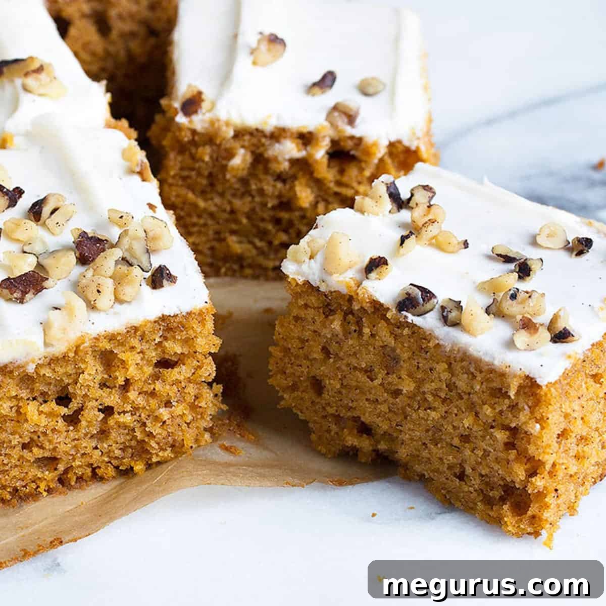 Pumpkin sheet cake topped with generous cream cheese frosting