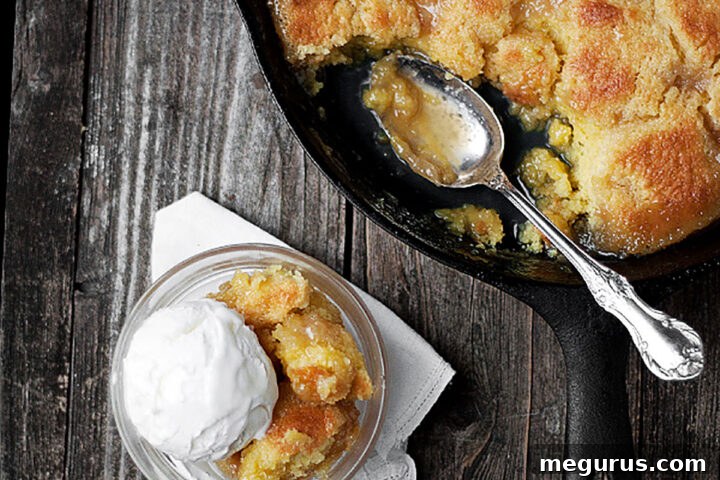 Maple pudding cake in skillet and spooned into bowl