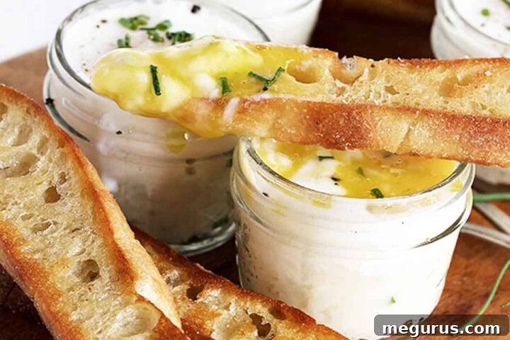 Coddled eggs with mashed potatoes, served in small jars with toasted bread.