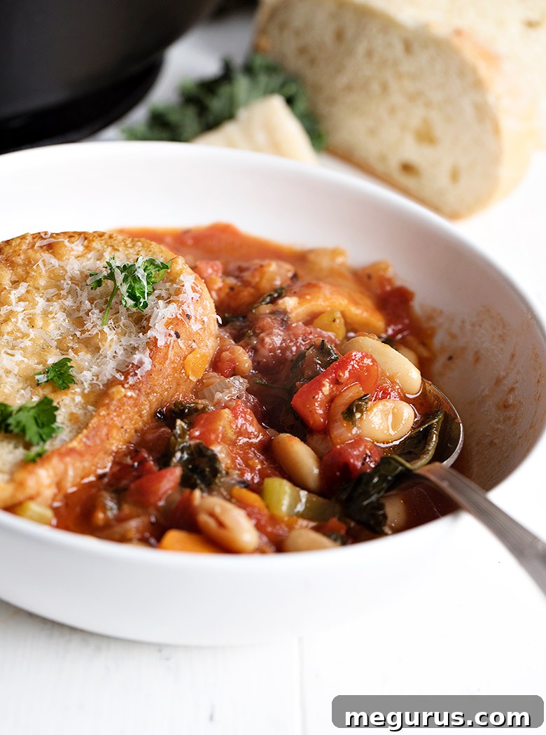 ribollita soup in bowl with bread slice on top