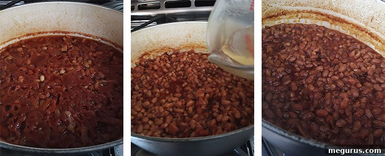 A close-up shot of perfectly cooked homemade baked beans in a casserole dish, showing the thick, glossy sauce and tender beans after baking.