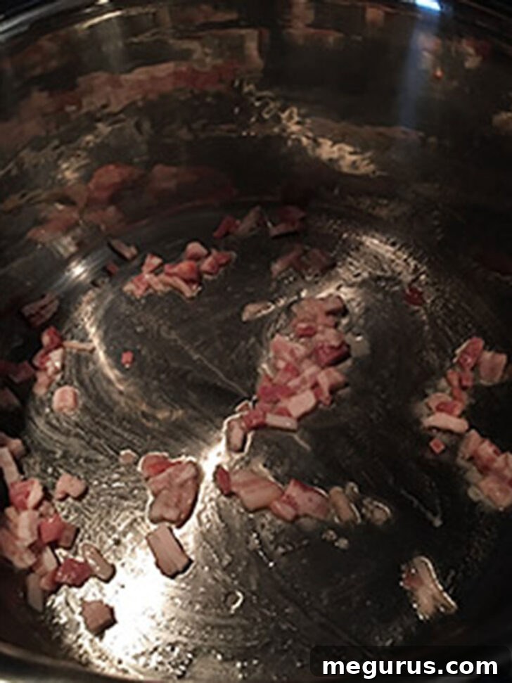 Pancetta cooking in the soup pot.