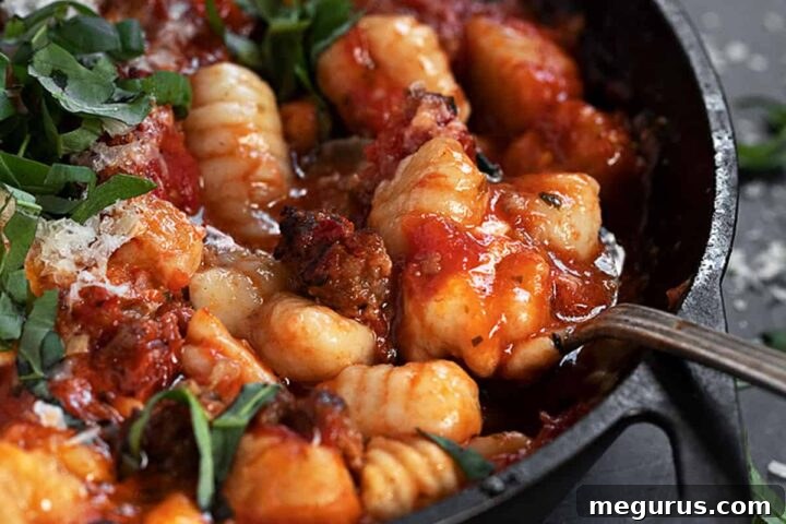 baked gnocchi with sausage in skillet