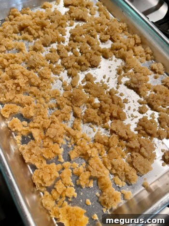 Freshly baked crumb topping, golden brown and ready to be crumbled.