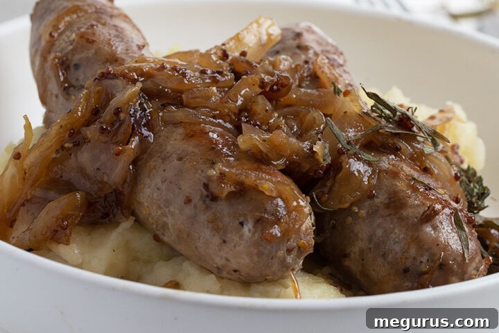 pork sausage with mustard onions in bowl