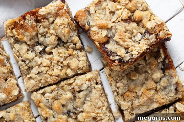 Old-fashioned date squares cut on serving board.