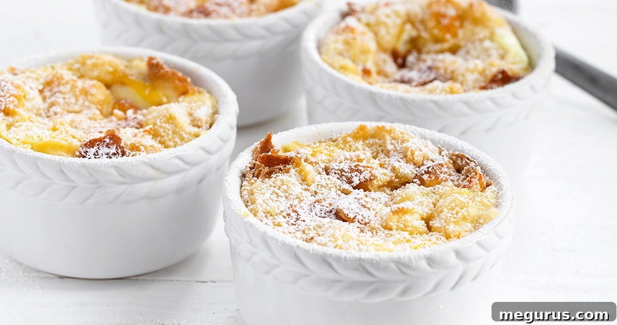 Delicious Orange Marmalade Bread Pudding in white ramekins