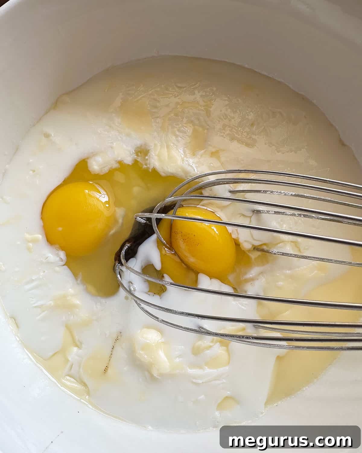 mixing wet ingredients in bowl