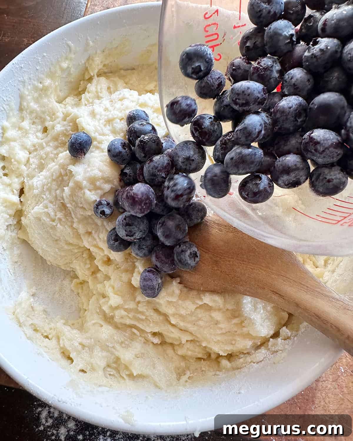 adding blueberries