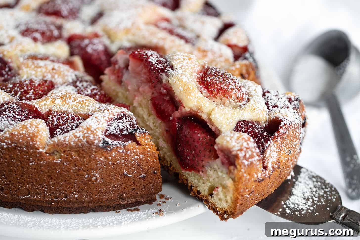Delicious strawberry yogurt cake sliced and ready to serve