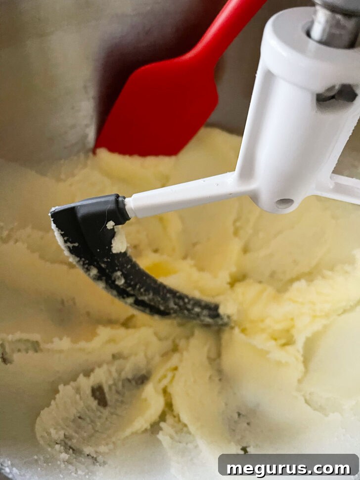 Creamed butter and sugar mixture, showing a light and aerated texture