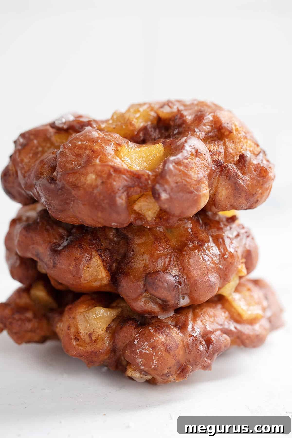 apple fritter yeast doughnuts stacked