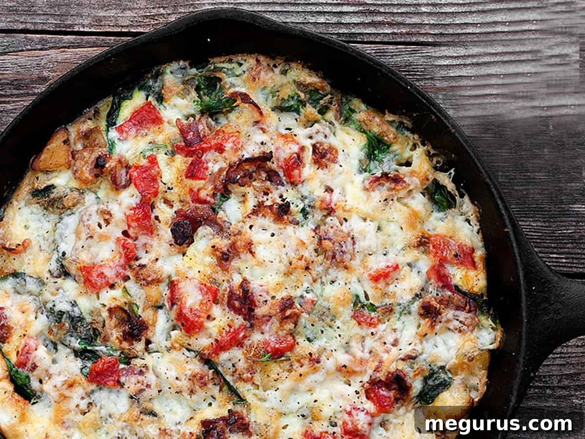 potato bacon cheese frittata in cast iron skillet