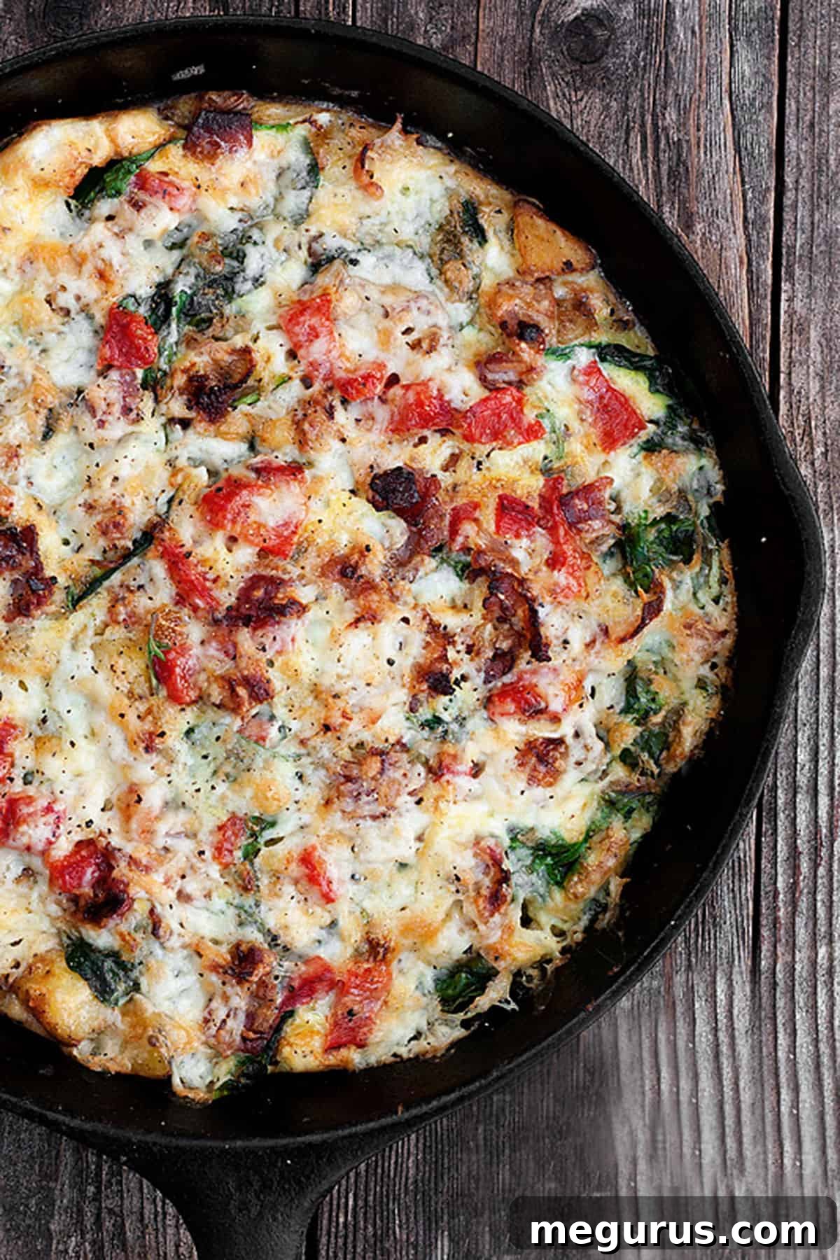 potato bacon cheese frittata in cast iron skillet