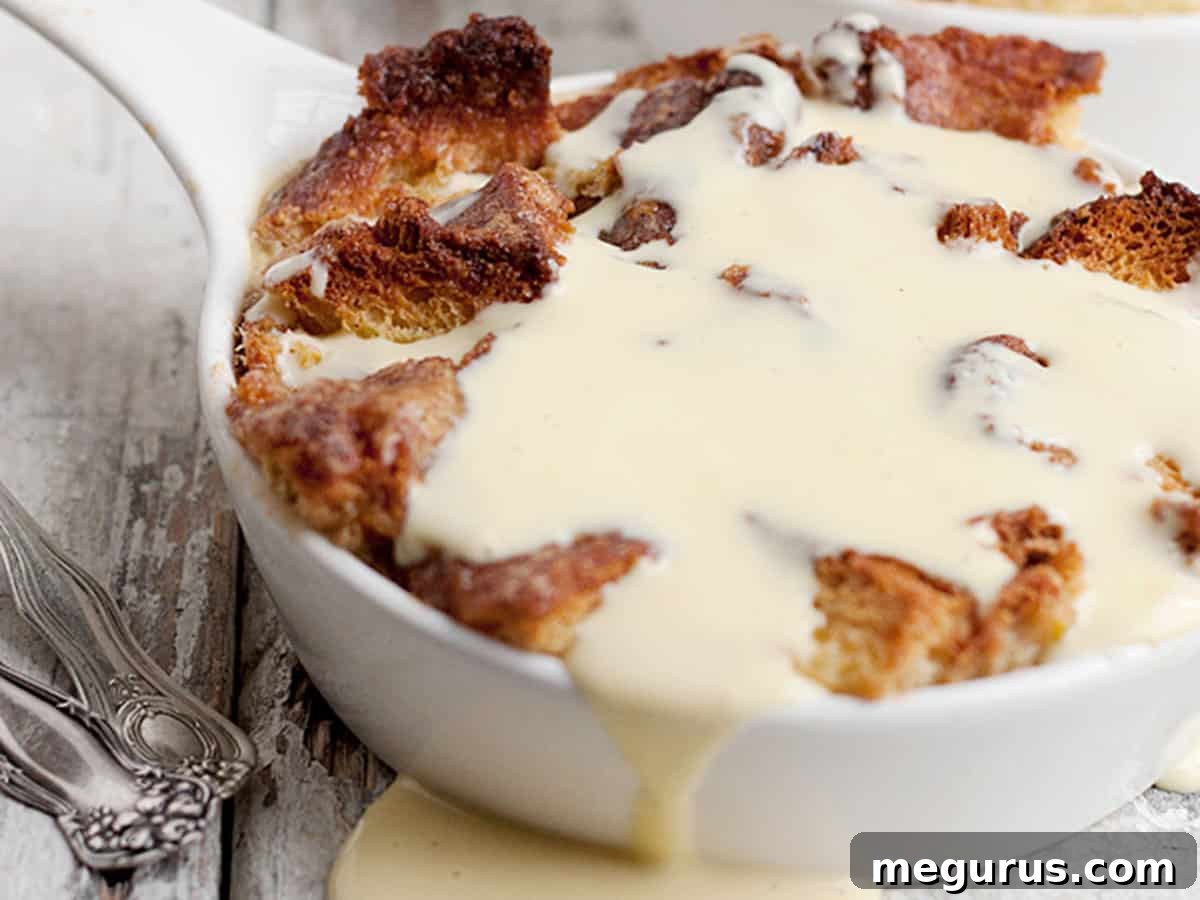 Warm Cinnamon Bread Pudding topped with luscious Crème Anglaise sauce