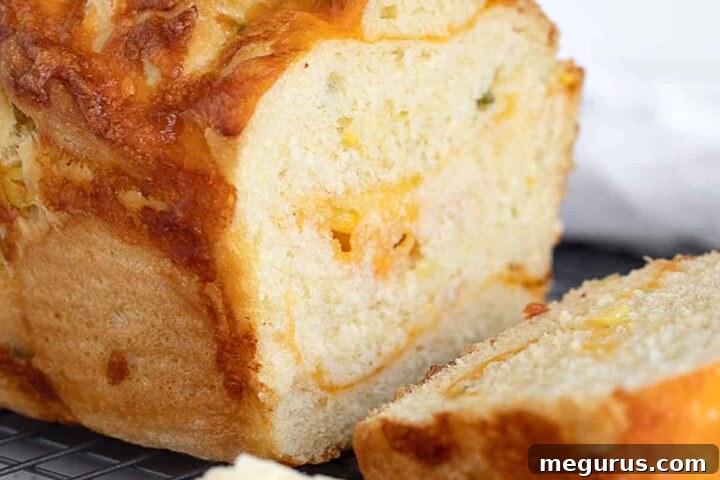 jalapeno corn cheese bread sliced on cooling rack