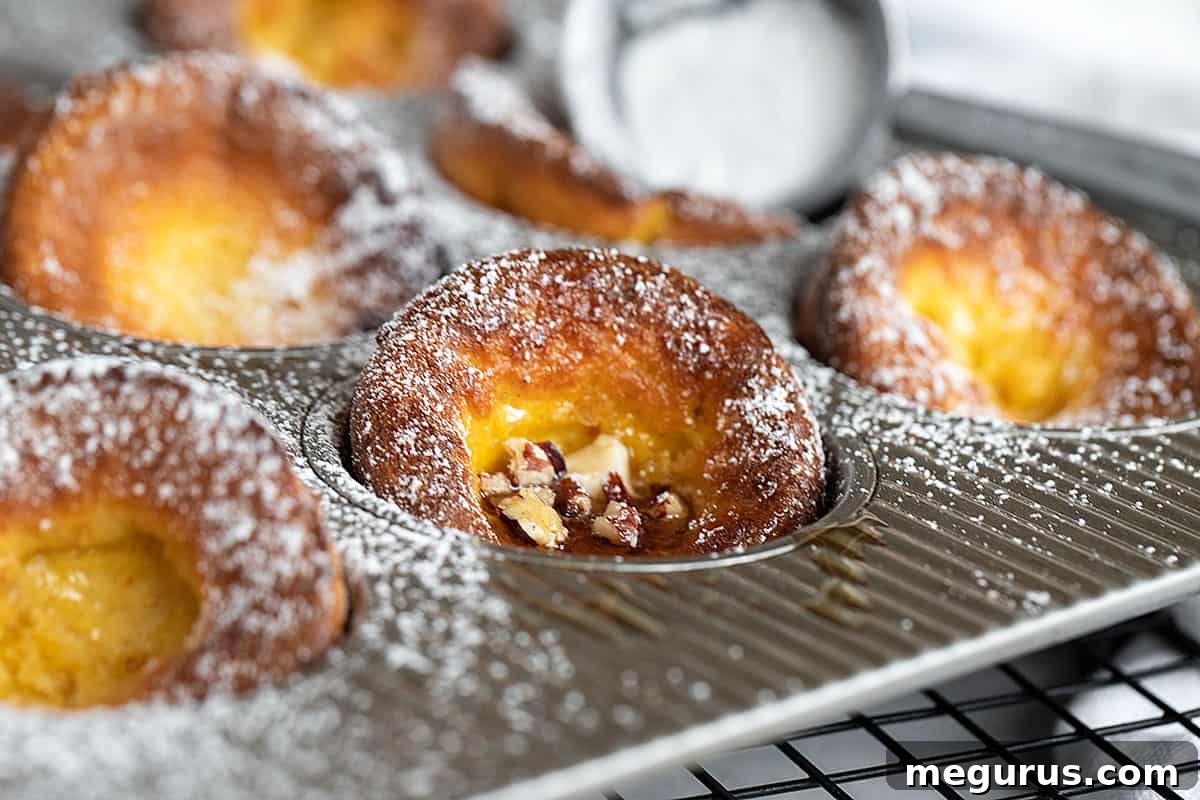 mini pumpkin Dutch baby pancakes in muffin tin