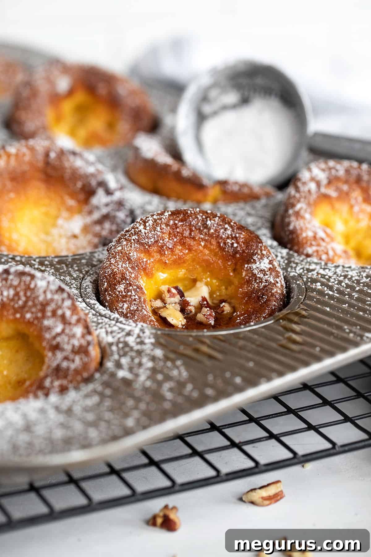 mini pumpkin Dutch baby pancakes in muffin tin