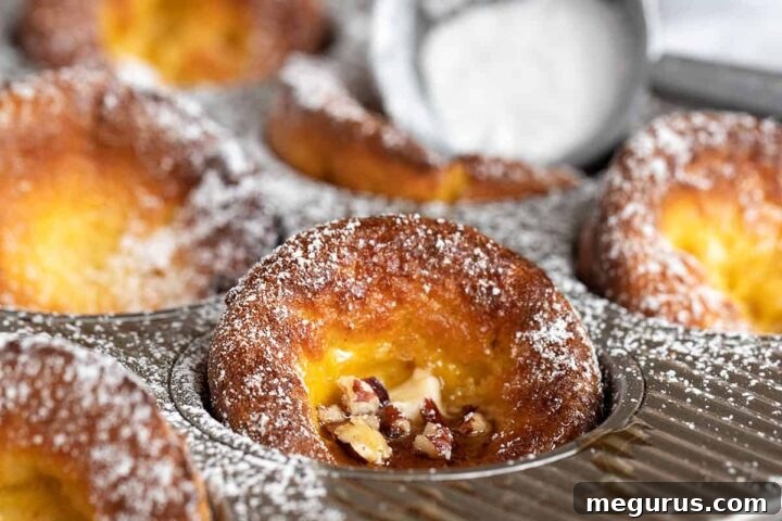 mini pumpkin Dutch baby pancakes in muffin tin