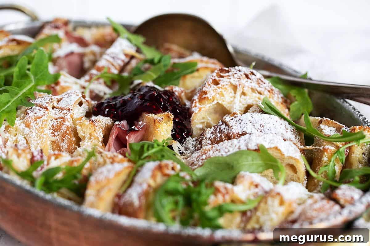 Savoury Ham and Cheese Bread Pudding in a baking dish, ready to be served for breakfast or brunch.