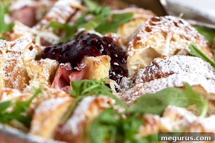 Savoury Ham and Cheese Bread Pudding in a baking dish, ready to be served