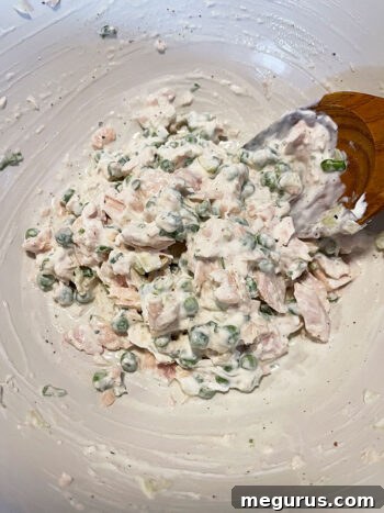 Tuna filling ingredients mixed together with sauce