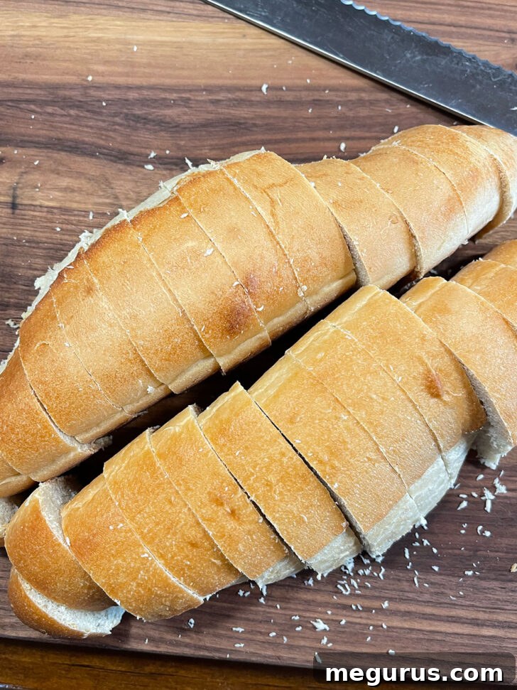 Cut the halves of bread in slices.
