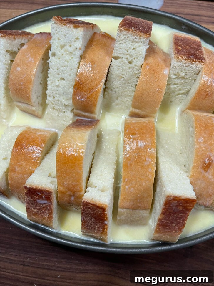 Custard poured over the bread slices.
