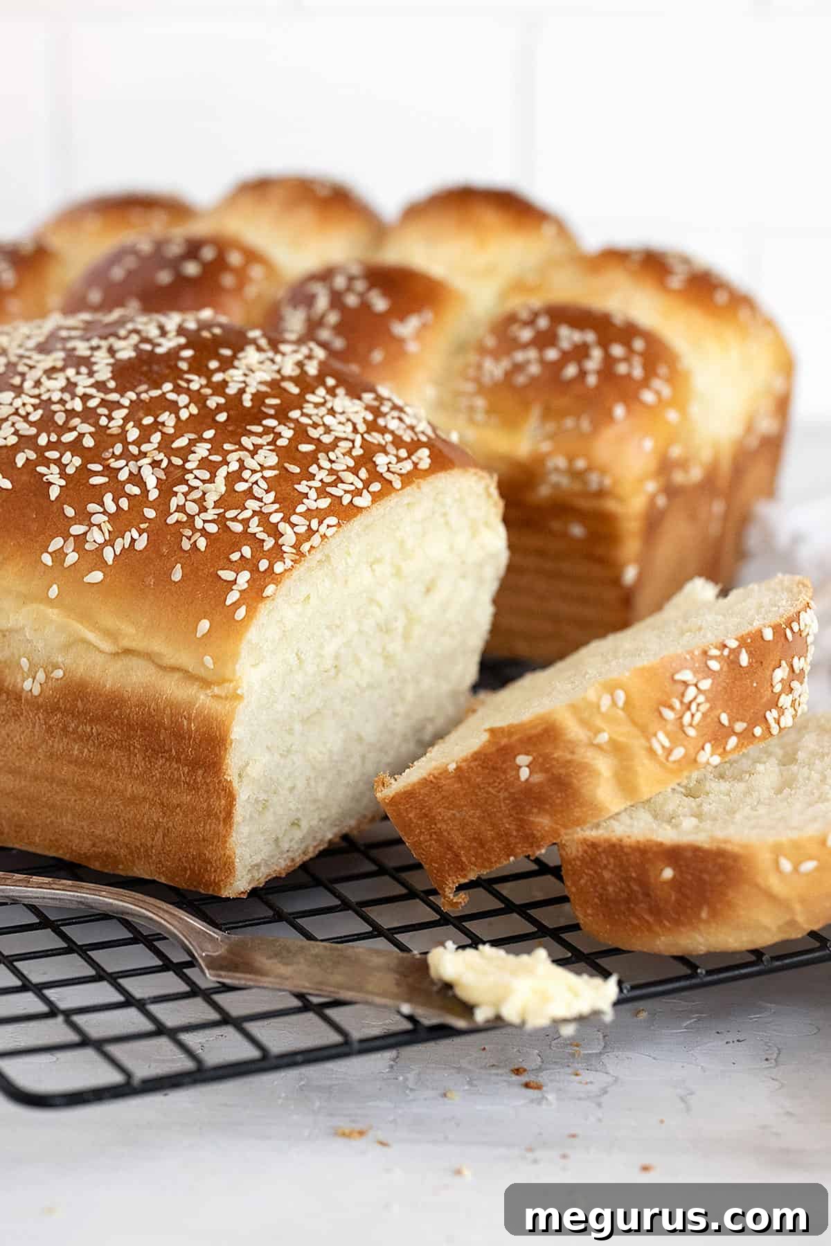 buttermilk bread loaves on cooling rack