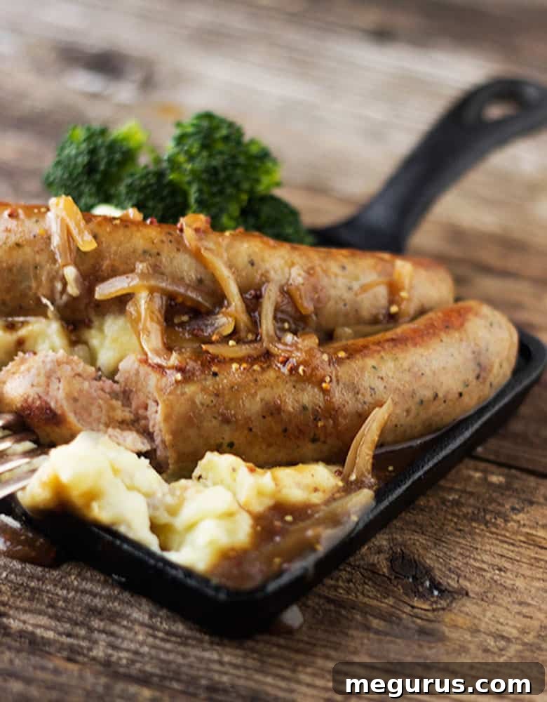 Close-up of creamy sour cream mashed potatoes with gravy