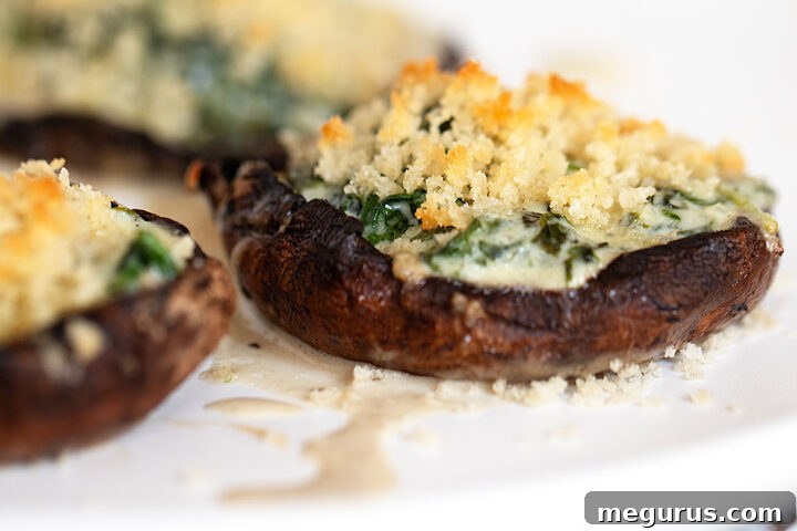 spinach stuffed portobello mushrooms on plate