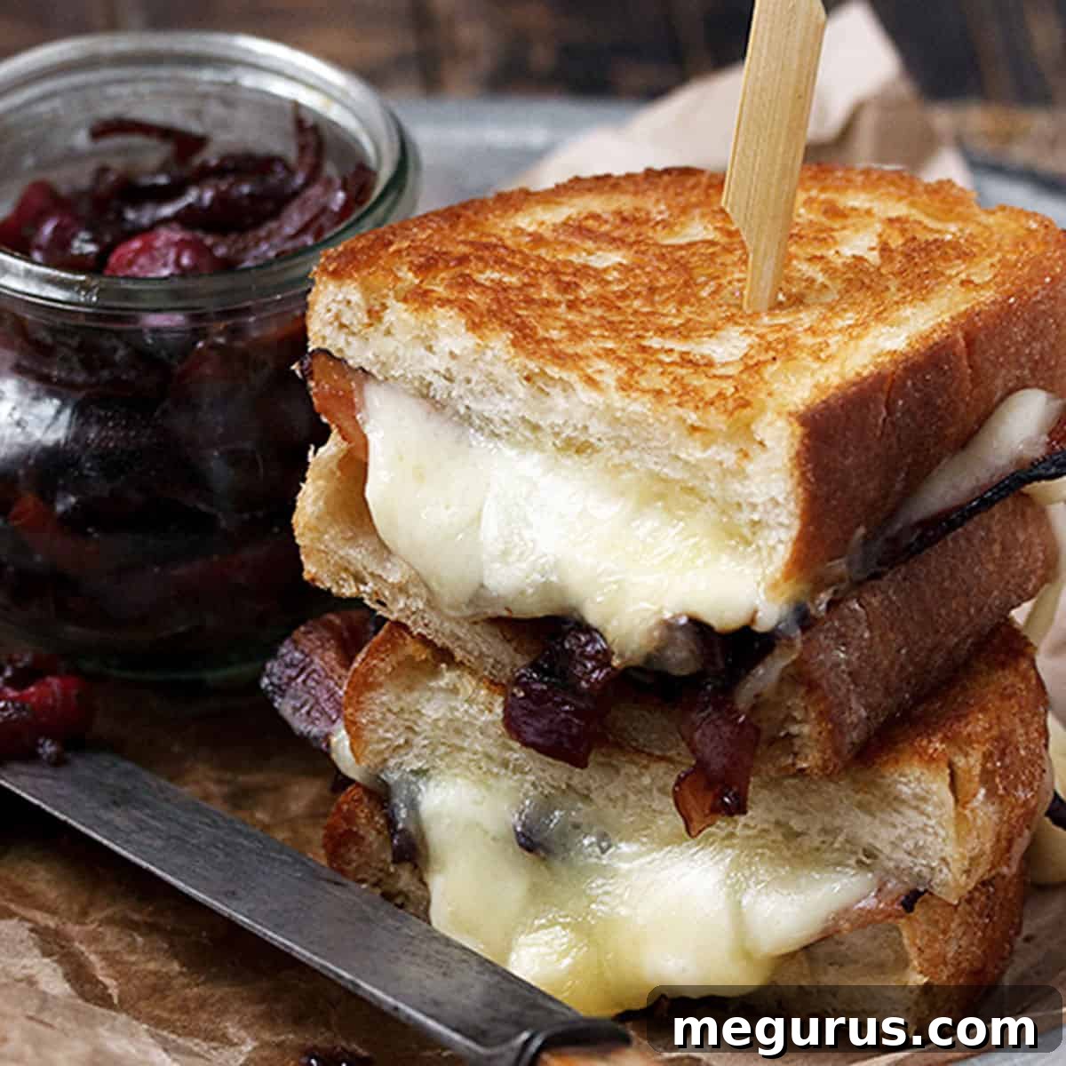 cheese curd grilled cheese on plate with bacon marmalade