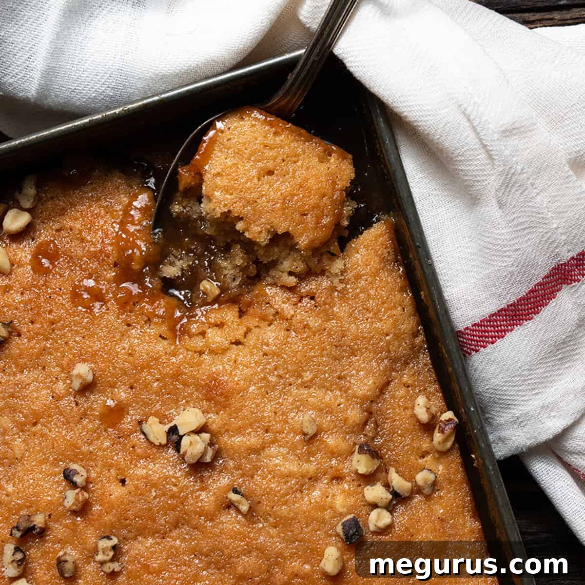 pudding chomeur in pan with spoon